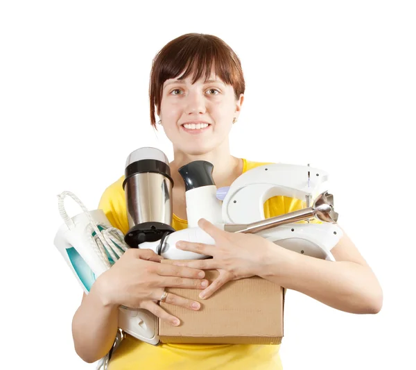 Vrouw met huishoudelijke apparaten — Stockfoto