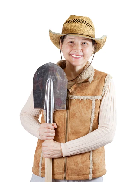 Щаслива зріла жінка з лопатою — стокове фото