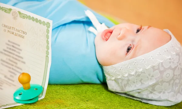 stock image Baby with certificate of birth