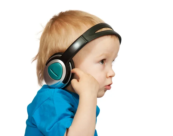 Niño de camisa azul con auriculares — Foto de Stock