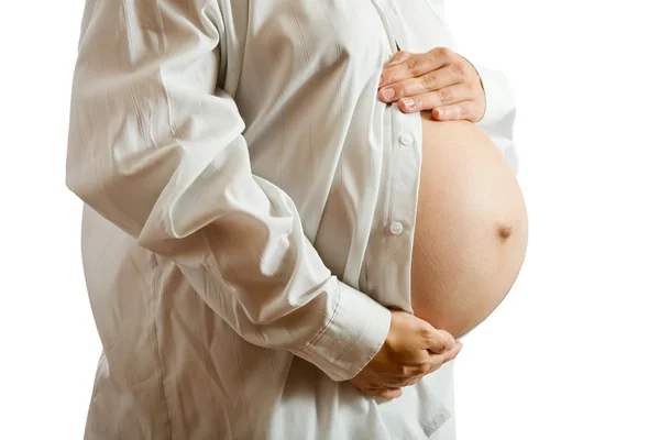 9 个月孕妇的肚子上 — 图库照片