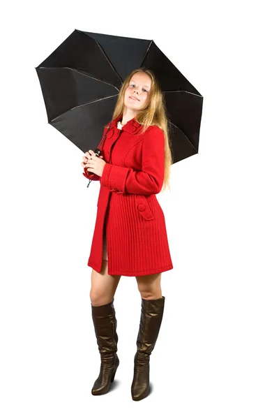 Vrouw in rode jas met paraplu — Stockfoto