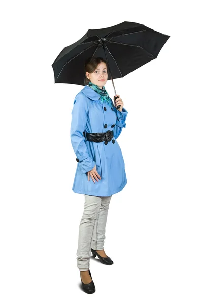 Meisje in mantel met paraplu — Stockfoto