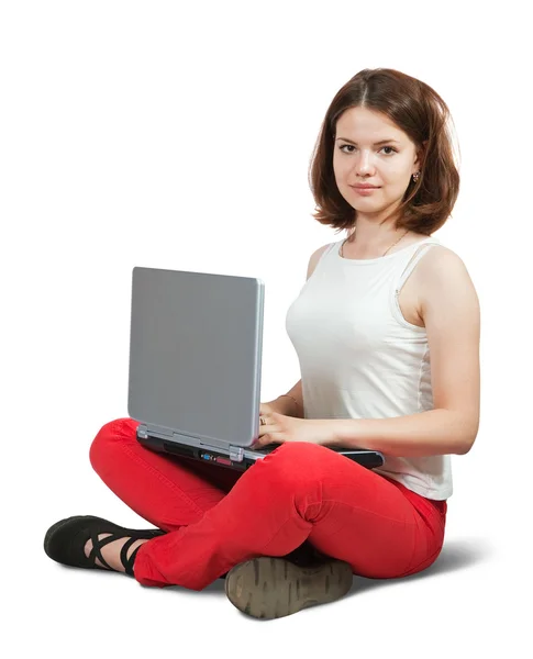 Dívka sedí s notebookem — Stock fotografie