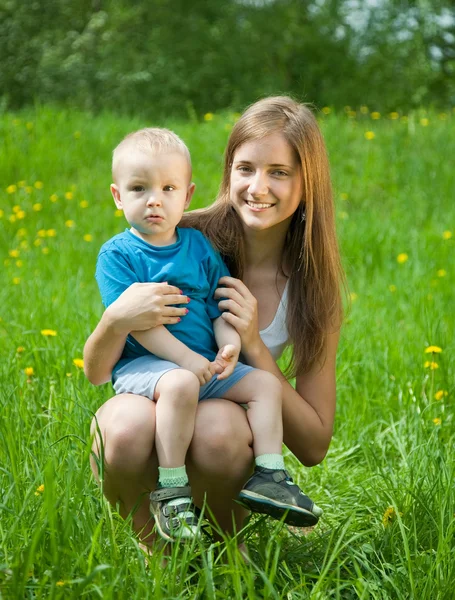 Teen sister and baby brother — Stock Photo, Image