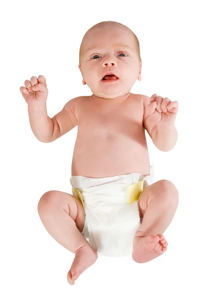 Baby i blöja över vita — Stockfoto
