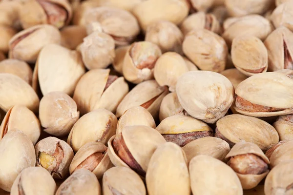 Achtergrond van pimpernoten (pistaches) — Stockfoto