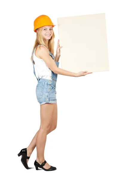 Construtora de casa feminina segura tela em branco — Fotografia de Stock