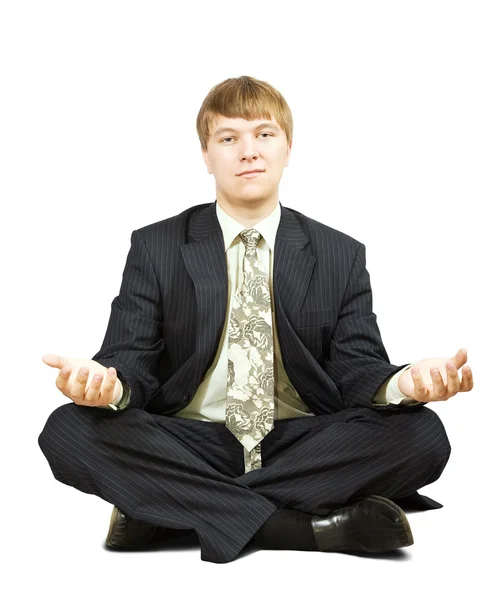 Homme d'affaires dans la pose de yoga — Photo