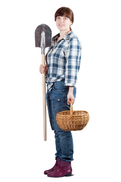 Woman with spade and basket — Stock Photo, Image
