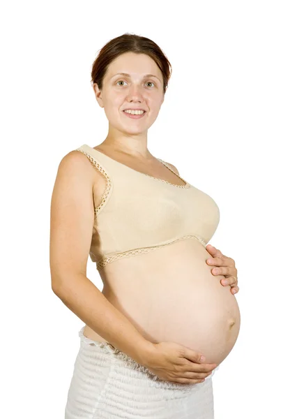 Terhes lány hasára gazdaság — Stock Fotó