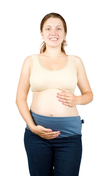Woman holding pregnant belly Stock Picture