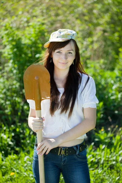Happy gardener with spade — Stock Photo, Image
