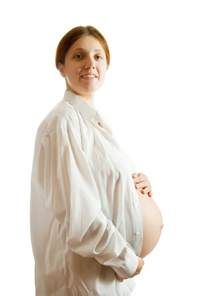 Mujer embarazada con camisa blanca —  Fotos de Stock