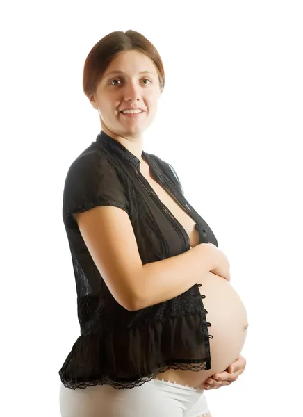 Mujer embarazada sobre blanco —  Fotos de Stock