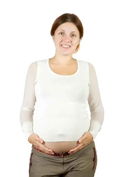 Kobieta w ciąży szczęśliwa trzymając jej brzuch — Zdjęcie stockowe
