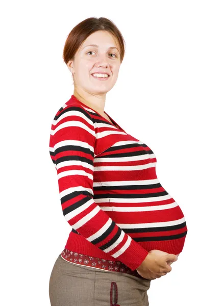 Mujer embarazada sobre blanco — Foto de Stock