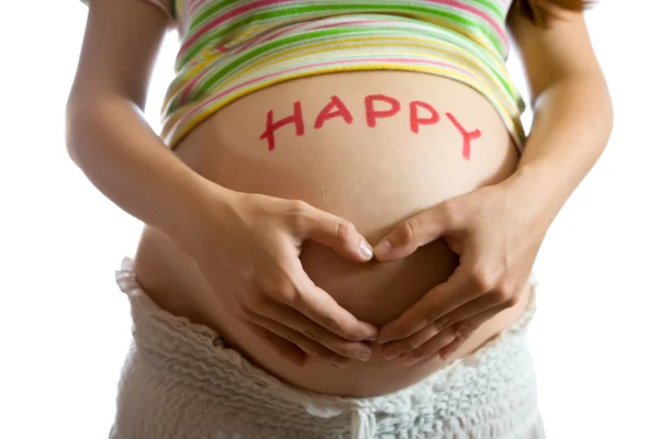 Mulher grávida com HAPPY na barriga — Fotografia de Stock