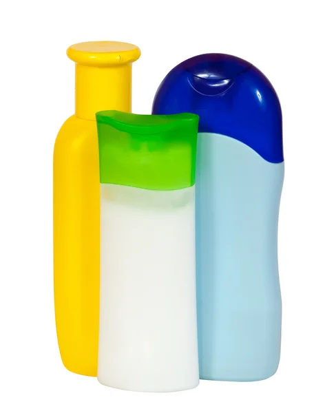 Três garrafas de produtos de higiene pessoal — Fotografia de Stock