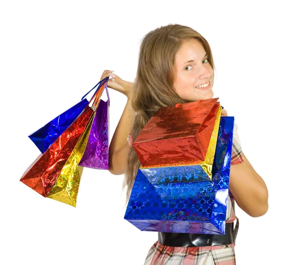 Teen girl holding shopping bags — Stock Photo, Image