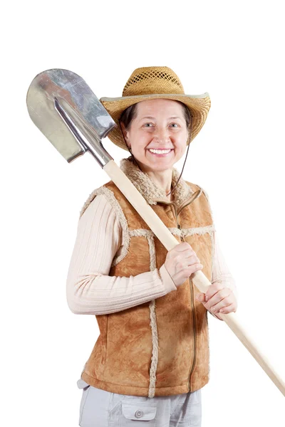 Pastoral kadın spade ile — Stok fotoğraf