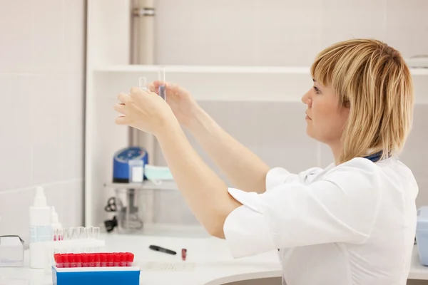 stock image Woman doctor with test tube