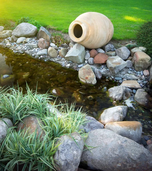 stock image Big pitcher on river.