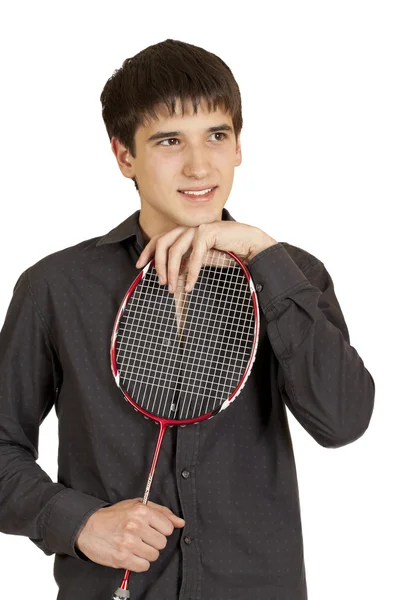 Portrait of a young cute guy with the racket in the hands of — Stock Photo, Image