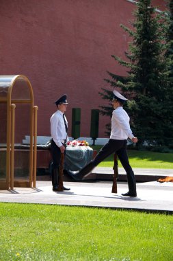 MOSCOW - JULY 18: Change of the guard at the Eternal Flame post clipart