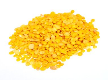 Yellow lentils isolated on white background.Macro shot clipart