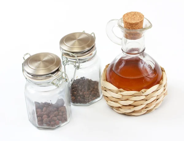 stock image Vinegar bottle, spices on the white