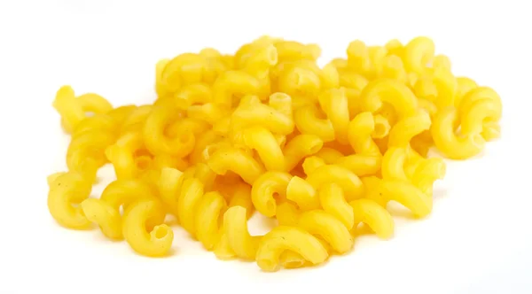 Getrocknete italienische Pasta auf weißem Hintergrund — Stockfoto
