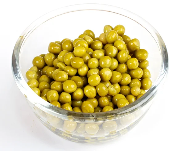 Green peas on a white background — Stock Photo, Image