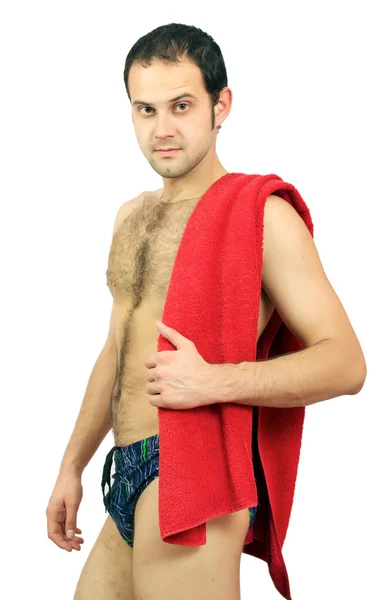 Beautiful muscular man with the towel. — Stock Photo, Image