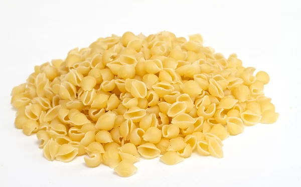 Close up of a dried italian pasta on white background — Stock Photo, Image