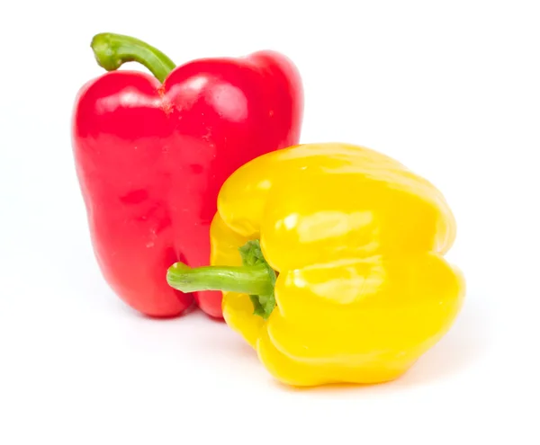 stock image Red and yellow pepper are isolated on a white background