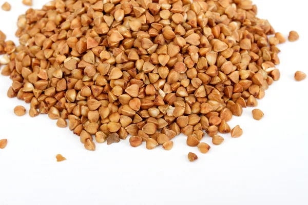 Isolated buckwheat on white background. Handful of grain — Stock Photo, Image