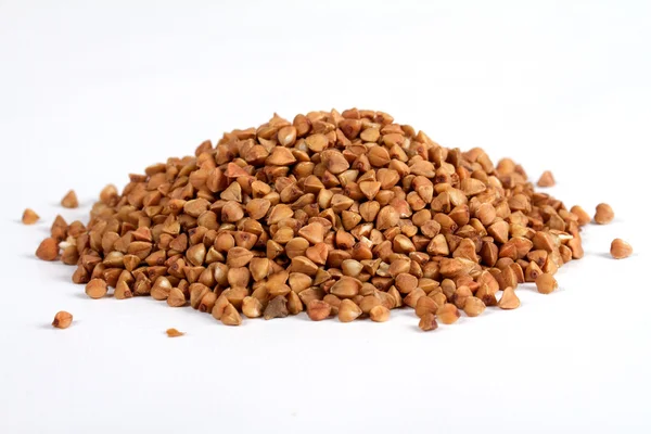 Isolated buckwheat on white background. Handful of grain — Stock Photo, Image