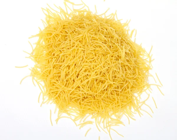 Close up of a dried italian pasta on white background — Stock Photo, Image