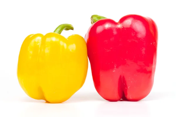 stock image Red and yellow pepper are isolated on a white background