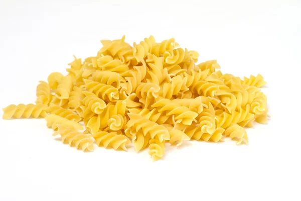Primer plano de una pasta italiana seca sobre fondo blanco —  Fotos de Stock
