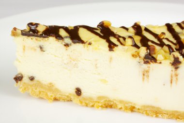 gurme dilim beyaz zemin üzerine cheesecake