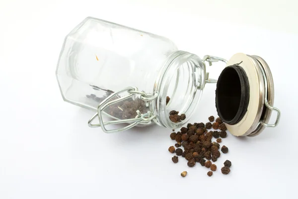 A pile of peppercorns in the bottle — Stock Photo, Image