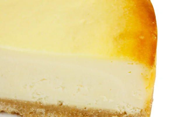 Kawałek wyśmienity sernik na białym tle — Zdjęcie stockowe