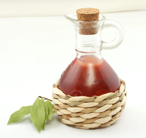 stock image Vinegar bottle and laurel leaf