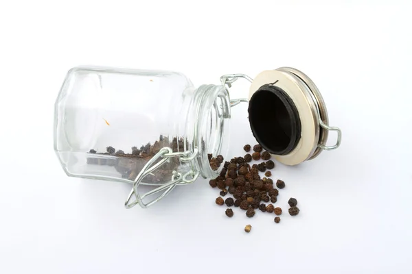 A pile of peppercorns in the bottle — Stock Photo, Image