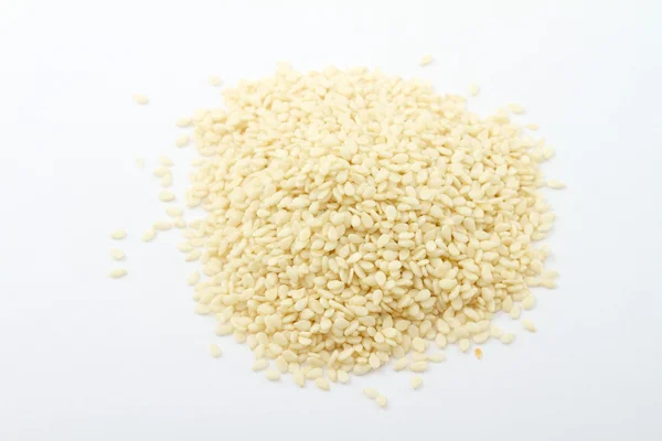 A close up on a pile of dried Sesame Seed isolated — Stock Photo, Image