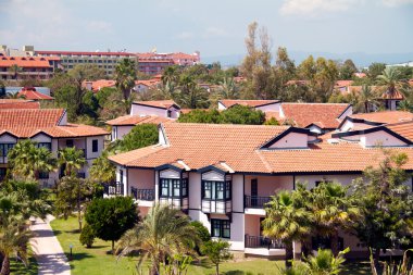 Luxury residences along Mediterranean sea in Turkey clipart
