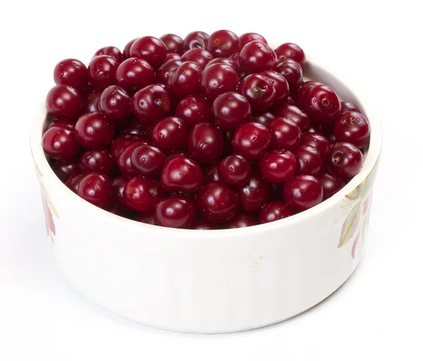 stock image Bowl with ripe cherries. Isolated on a white background.