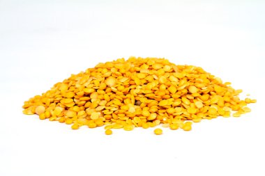 Yellow lentils isolated on white background.Macro shot. clipart